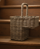 Wicker baskets on a wooden staircase