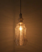 Decorative pendant light with a warm glow against a brown background
