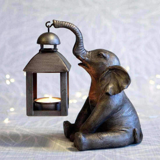 Sitting Elephant Holding a Lantern - The Farthing