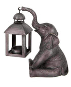 Sitting Elephant Holding a Lantern - The Farthing