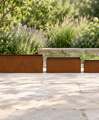 Square side-profile view of three planters