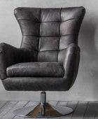 Vintage Black Leather Swivel Chair - The Farthing
