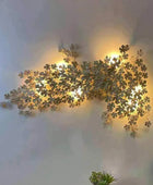 Distressed Leaves Cascade Statement Wall Light - The Farthing