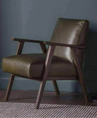 Mid Century Green Leather Chair - The Farthing